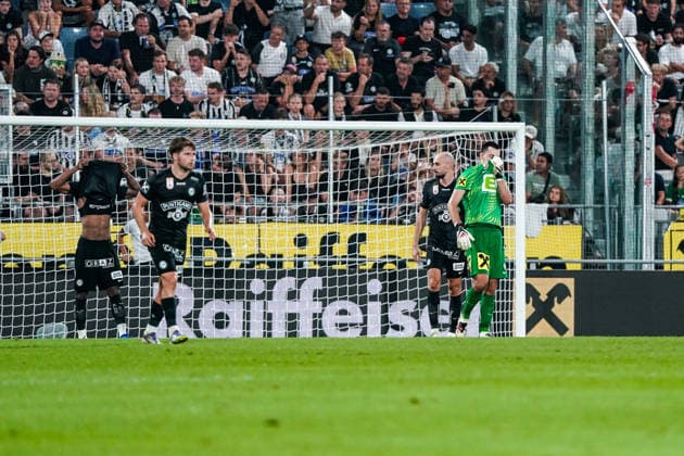 Soccer Austria UEFA Champions League Qualifying 2026–2027, Third Round, August 11, 2026: SK Sturm Graz (Austria) vs. Fenerbahçe Istanbul (Turkey) at Merkur Arena, Graz, Austria. Sturm players look disappointed after Talisca’s goal gave Fenerbahçe a 1–0 lead. Copyright: xLUKAxKOLANOVICx