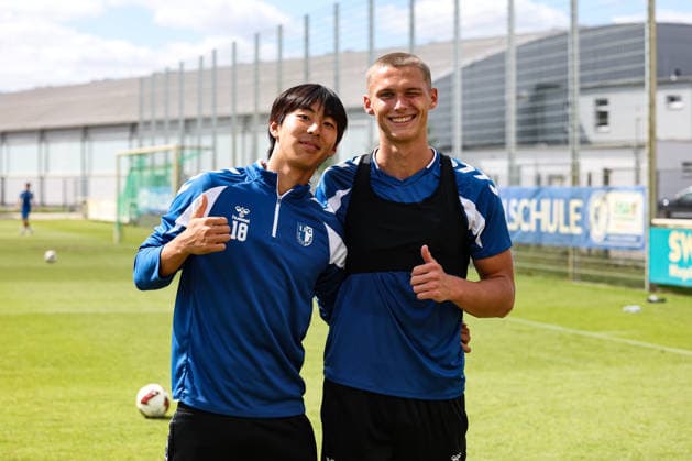Chunghyun Lee, 1 FC Magdeburg,18, and Kevin Manthey, 1 FC Magdeburg, 20, warming up with the U-23 team of 1 FC Magdeburg for the evening match against Babelsberg 2 in the 2026–2027 Bundesliga season. 1 FC Magdeburg training at the Avnet Arena in Magdeburg. Soccer, Men,Men, Germany, August 11, 2026