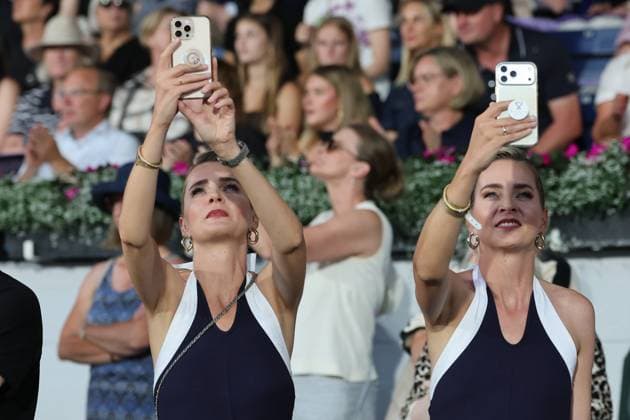 Meise Twins with Cell Phones in Action, Celebrities, Opening Ceremony, AACHEN FEI World Championships 2026, World Equestrian Festival, 2026 World Equestrian Games, Aachen 2026, Welcome Home 2026, Aachen Soers, August 11–23, 2026, Equestrian Sports, August 11, 2026, Aachen Soers, Germany