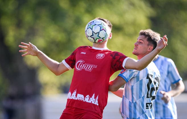 Soccer WFV Cup 2026–2027, Round 3, August 11, 2026: FC Rottenburg vs. SV Stuttgarter Kickers. Aaron Leyhr (left), FC Rottenburg, with the ball in front of his head, against Maximilian Zaiser (right), Kickers