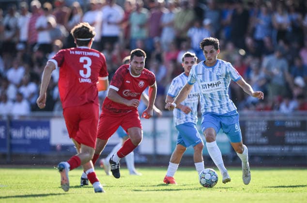 Soccer WFV Cup 2026–2027, Round 3, August 11, 2026: FC Rottenburg vs. SV Stuttgarter Kickers—Ben Luca Fisher (right), Kickers, vs. Rene Hirschka (center), FC Rottenburg
