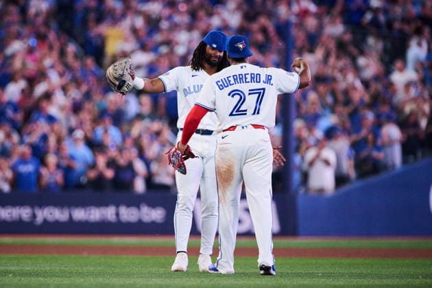August 11, 2026, Toronto, On, Canada: Toronto Blue Jays Charles McAdoo (26) and Vladimir Guerrero Jr. (27) celebrate after their win against the Boston Red Sox during ninth inning MLB, Baseball Herren, USA baseball action in Toronto, on Tuesday, Aug. 11, 2026. Canada News - August 11, 2026 - ZUMAc35_ 20260811_zaf_c35_143 Copyright: xSammyxKoganx