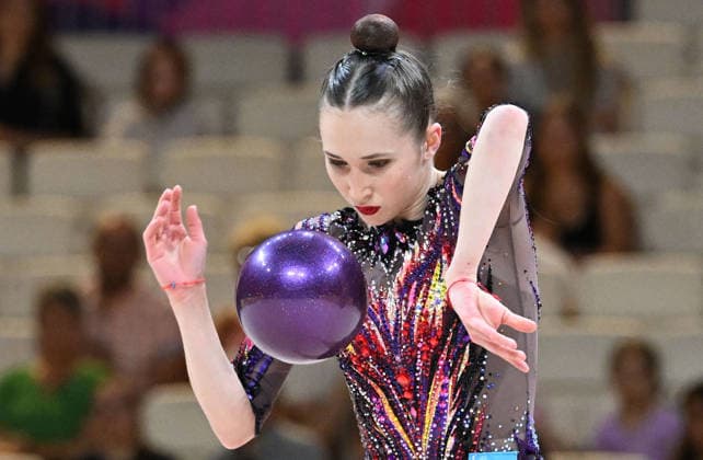 August 12, 2026, xhbx, 2026 Rhythmic Gymnastics World Championships, from left: Takhmina Ikromova, Uzbekistan, ball routine. DFL and DFB regulations prohibit any use of photographs as image sequences and or quasi-video. Frankfurt am Main