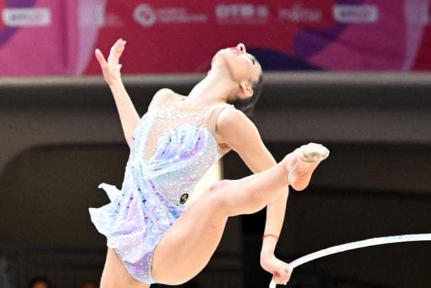 August 12, 2026, xhbx, 2026 Rhythmic Gymnastics World Championships, from left: Eva Brezalieva (Bulgaria), hoop routine. DFL and DFB regulations prohibit any use of photographs as image sequences and or quasi-video. Frankfurt am Main