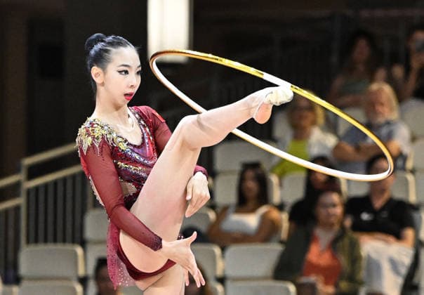August 12, 2026, xhbx, 2026 Rhythmic Gymnastics World Championships, from left: Qi Wang (China), hoop routine. DFL and DFB regulations prohibit any use of photographs as image sequences and or quasi-video. Frankfurt am Main