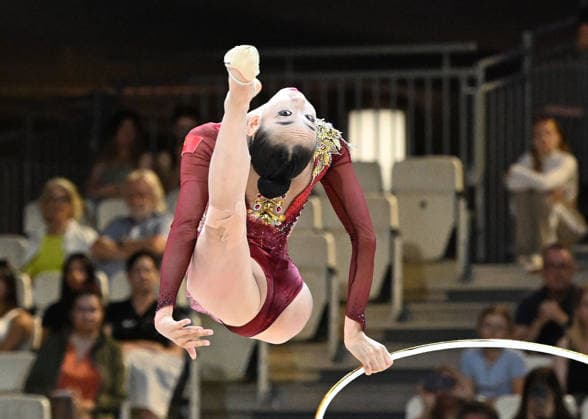 August 12, 2026, xhbx, 2026 Rhythmic Gymnastics World Championships, from left: Qi Wang (China), hoop routine. DFL and DFB regulations prohibit any use of photographs as image sequences and or quasi-video. Frankfurt am Main