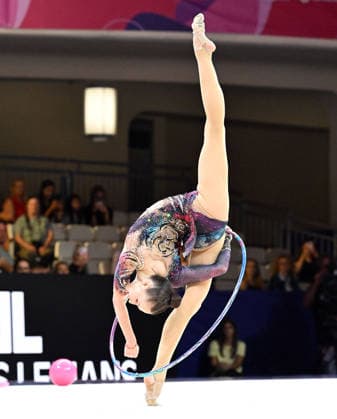 August 12, 2026, xhbx, 2026 Rhythmic Gymnastics World Championships, from left: Takhmina Ikromova, Uzbekistan, hoop routine. DFL and DFB regulations prohibit any use of photographs as image sequences and or quasi-video. Frankfurt am Main