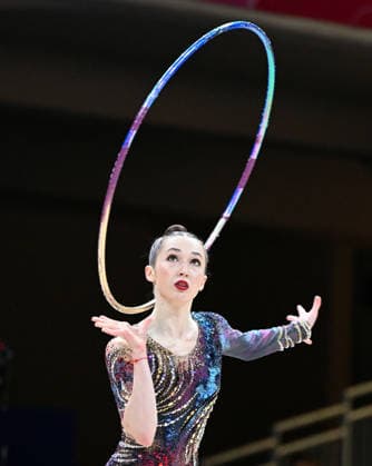 August 12, 2026, xhbx, 2026 Rhythmic Gymnastics World Championships, from left: Takhmina Ikromova, Uzbekistan, hoop routine. DFL and DFB regulations prohibit any use of photographs as image sequences and or quasi-video. Frankfurt am Main