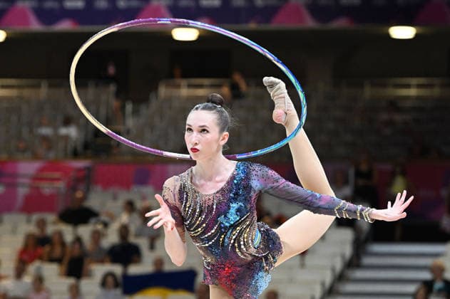 August 12, 2026, xhbx, 2026 Rhythmic Gymnastics World Championships, from left: Takhmina Ikromova, Uzbekistan, hoop routine. DFL and DFB regulations prohibit any use of photographs as image sequences and or quasi-video. Frankfurt am Main