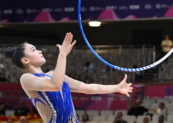 August 12, 2026, xhbx, 2026 Rhythmic Gymnastics World Championships, from left: Lauren Grüniger (Switzerland), hoop routine. DFL and DFB regulations prohibit any use of photographs as image sequences and or quasi-video. Frankfurt am Main