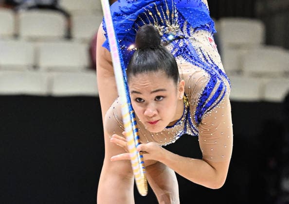 August 12, 2026, xhbx, 2026 Rhythmic Gymnastics World Championships, from left: Lauren Grüniger (Switzerland), hoop routine. DFL and DFB regulations prohibit any use of photographs as image sequences and or quasi-video. Frankfurt am Main