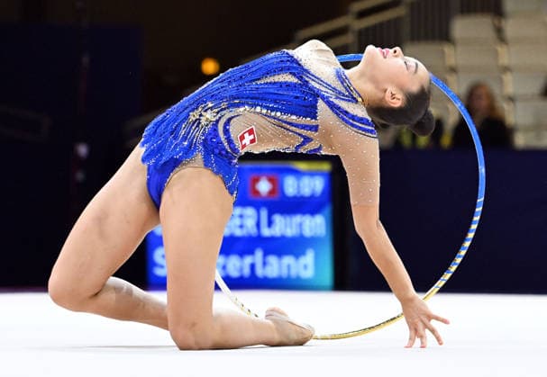 August 12, 2026, xhbx, 2026 Rhythmic Gymnastics World Championships, from left: Lauren Grüniger (Switzerland), hoop routine. DFL and DFB regulations prohibit any use of photographs as image sequences and or quasi-video. Frankfurt am Main
