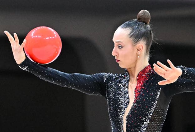 August 12, 2026, xhbx, 2026 Rhythmic Gymnastics World Championships, from left: Emilia Eichel, Poland, ball routine. DFL and DFB regulations prohibit any use of photographs as image sequences and or quasi-video. Frankfurt am Main