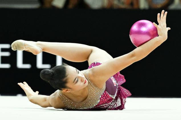 August 12, 2026, xhbx, 2026 Rhythmic Gymnastics World Championships, from left: Lauren Grüniger (Switzerland), ball routine. DFL and DFB regulations prohibit any use of photographs as image sequences and or quasi-video. Frankfurt am Main