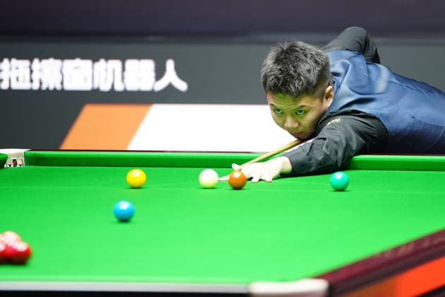 TAIYUAN, CHINA - AUGUST 12: Zhou Yuelong of China plays a shot in the second round match against Liu Hongyu of China on day 5 of the 2026 World Snooker Tour China Open at Taiyuan Binhe Sports Center on August 12, 2026 in Taiyuan, Shanxi Province of China.  Copyright: xTaixChengzhex 111659519963
