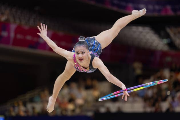 World Rhythmic Gymnastics Championships: Gloria Sanchez Arguedas of Costa Rica during her hoop routine. World Rhythmic Gymnastics Championships, August 11–16, at the Festhalle in Frankfurt am Main. Qualifying Round, Day 1, Frankfurt am Main, Hesse, Germany, Festhalle