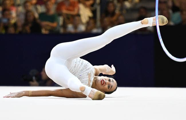 August 12, 2026, xhbx, 2026 Rhythmic Gymnastics World Championships, from left: Alba Bautista (Spain), hoop routine. DFL and DFB regulations prohibit any use of photographs as image sequences and or quasi-video. Frankfurt am Main