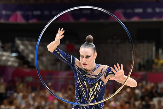August 12, 2026, xhbx, 2026 Rhythmic Gymnastics World Championships, from left: Darja Varfolomeev (Germany), hoop routine. DFL and DFB regulations prohibit any use of photographs as image sequences and or quasi-video. Frankfurt am Main