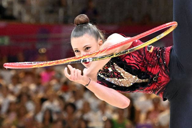 August 12, 2026, xhbx, 2026 Rhythmic Gymnastics World Championships, from left: Lada Pusch, Germany, hoop routine. DFL and DFB regulations prohibit any use of photographs as image sequences and or quasi-video. Frankfurt am Main