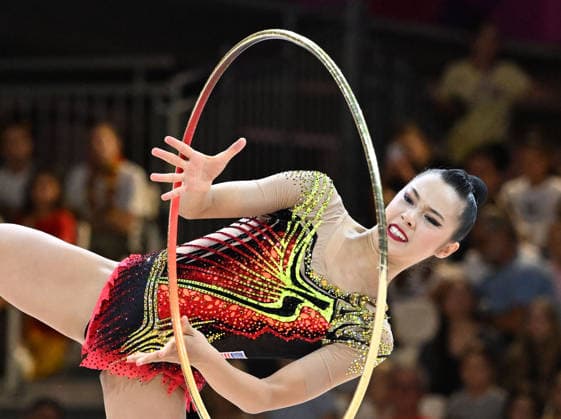 August 12, 2026, xhbx, 2026 Rhythmic Gymnastics World Championships, from left: Rin Keys (USA), hoop routine. DFL and DFB regulations prohibit any use of photographs as image sequences and or quasi-video. Frankfurt am Main