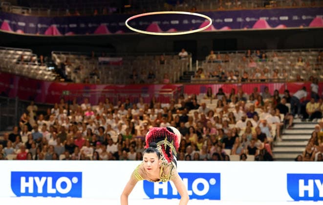 August 12, 2026, xhbx, 2026 Rhythmic Gymnastics World Championships, from left: Rin Keys (USA), hoop routine. DFL and DFB regulations prohibit any use of photographs as image sequences and or quasi-video. Frankfurt am Main