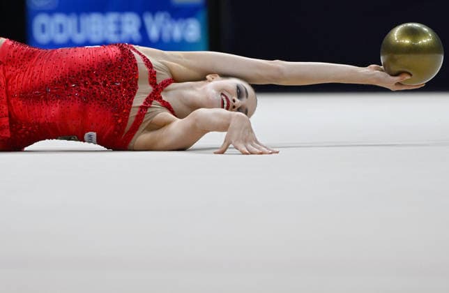 August 12, 2026, xhbx, 2026 Rhythmic Gymnastics World Championships, from left: Darja Varfolomeev, Germany, ball routine. DFL and DFB regulations prohibit any use of photographs as image sequences and or quasi-video. Frankfurt am Main