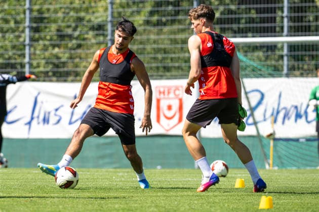 Regionalliga Northeast, Season 26–27: Hallescher FC Training – New Signing Osman Atilgan, Halle, Germany, August 12, 2026. Pictured, from left: New signing Osman Atilgan (Halle) and Felix Langhammer (Halle), Halle Saale Leuna Chemie Stadium, Saxony-Anhalt, Germany