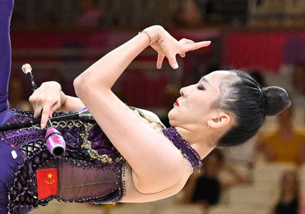 August 12, 2026, xhbx, 2026 Rhythmic Gymnastics World Championships, from left: Zilu Wang of China with clubs. DFL and DFB regulations prohibit any use of photographs as image sequences and or quasi-video. Frankfurt am Main