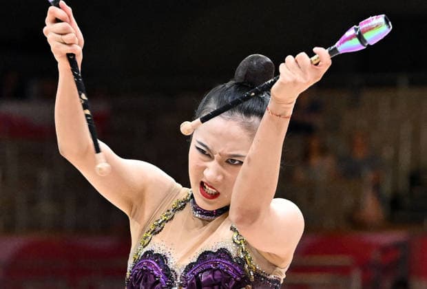 August 12, 2026, xhbx, 2026 Rhythmic Gymnastics World Championships, from left: Zilu Wang of China with clubs. DFL and DFB regulations prohibit any use of photographs as image sequences and or quasi-video. Frankfurt am Main