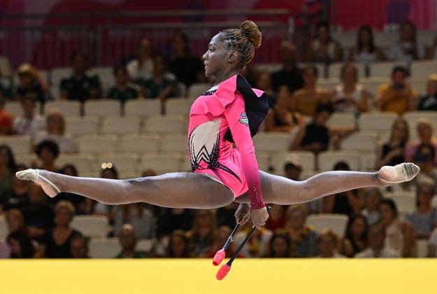 August 12, 2026, xhbx, 2026 Rhythmic Gymnastics World Championships, from left: Emilia Ekandjo of Namibia with clubs. DFL DFB REGULATIONS PROHIBIT ANY USE OF PHOTOGRAPHS as IMAGE SEQUENCES and or QUASI-VIDEO. Frankfurt am Main
