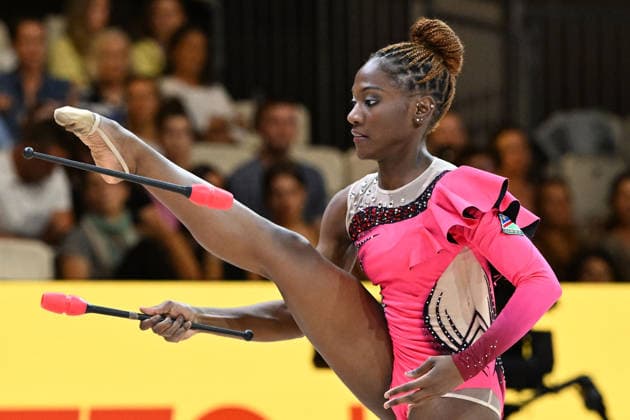 August 12, 2026, xhbx, 2026 Rhythmic Gymnastics World Championships, from left: Emilia Ekandjo of Namibia with clubs. DFL DFB REGULATIONS PROHIBIT ANY USE OF PHOTOGRAPHS as IMAGE SEQUENCES and or QUASI-VIDEO. Frankfurt am Main