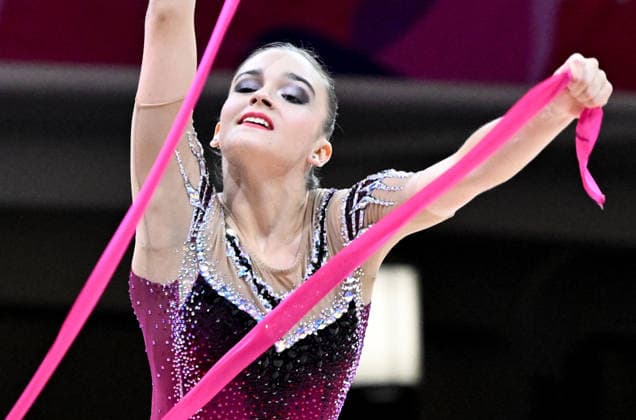 August 12, 2026, xhbx, 2026 Rhythmic Gymnastics World Championships, from left: Dina Mironskaya, Austria with ribbon. DFL DFB REGULATIONS PROHIBIT ANY USE OF PHOTOGRAPHS as IMAGE SEQUENCES and or QUASI-VIDEO. Frankfurt am Main