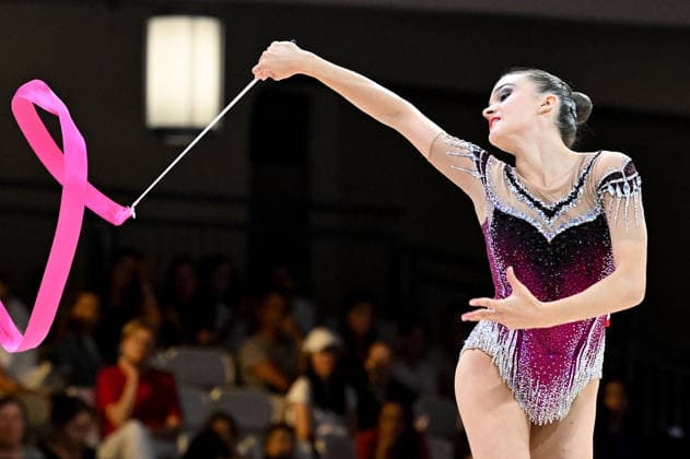 August 12, 2026, xhbx, 2026 Rhythmic Gymnastics World Championships, from left: Dina Mironskaya, Austria with ribbon. DFL DFB REGULATIONS PROHIBIT ANY USE OF PHOTOGRAPHS as IMAGE SEQUENCES and or QUASI-VIDEO. Frankfurt am Main