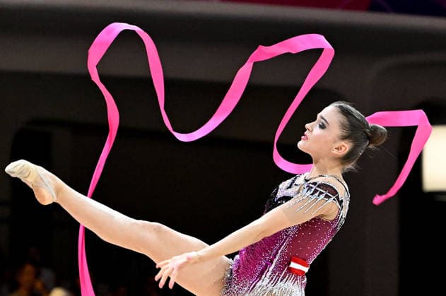 August 12, 2026, xhbx, 2026 Rhythmic Gymnastics World Championships, from left: Dina Mironskaya, Austria with ribbon. DFL DFB REGULATIONS PROHIBIT ANY USE OF PHOTOGRAPHS as IMAGE SEQUENCES and or QUASI-VIDEO. Frankfurt am Main