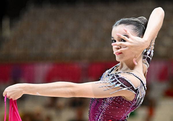 August 12, 2026, xhbx, 2026 Rhythmic Gymnastics World Championships, from left: Dina Mironskaya, Austria with ribbon. DFL DFB REGULATIONS PROHIBIT ANY USE OF PHOTOGRAPHS as IMAGE SEQUENCES and or QUASI-VIDEO. Frankfurt am Main
