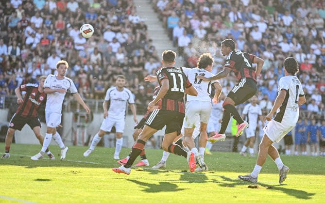 August 12, 2026, xfux, Soccer Friendly Match, FSV Frankfurt vs. Eintracht Frankfurt, from left: Goal Scorers, Otavio (Eintracht Frankfurt) scores a goal, Goal to make it 0–1, header, header duel. DFL and DFB regulations prohibit any use of photographs as image sequences and or quasi-video. Frankfurt am Main