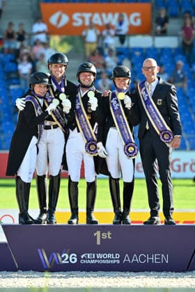 Aachen, Main Stadium, August 12, 2026, GER, FEI World Championships Aachen 2026, Lambertz Prize, Grand Prix Team Dressage—Winning photo of the World Champion Team Germany (from left): Isabell WERTH (Germany), Frederic WANDRES (Germany), Raphael NETZ (Germany), Katharina HEMMER (Germany), and team manager Klaus ROESER (Germany, North Rhine-Westphalia, Germany)