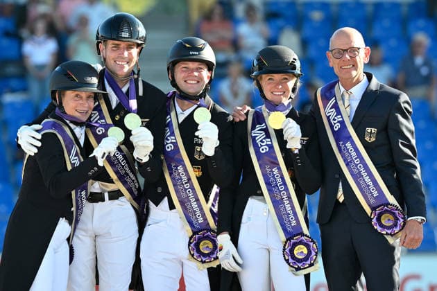 Aachen, Main Stadium, August 12, 2026, GER, FEI World Championships Aachen 2026, Lambertz Prize, Grand Prix Team Dressage—Winning photo of the World Champion Team Germany (from left): Isabell WERTH (Germany), Frederic WANDRES (Germany), Raphael NETZ (Germany), Katharina HEMMER (Germany), and team manager Klaus ROESER (Germany, North Rhine-Westphalia, Germany)