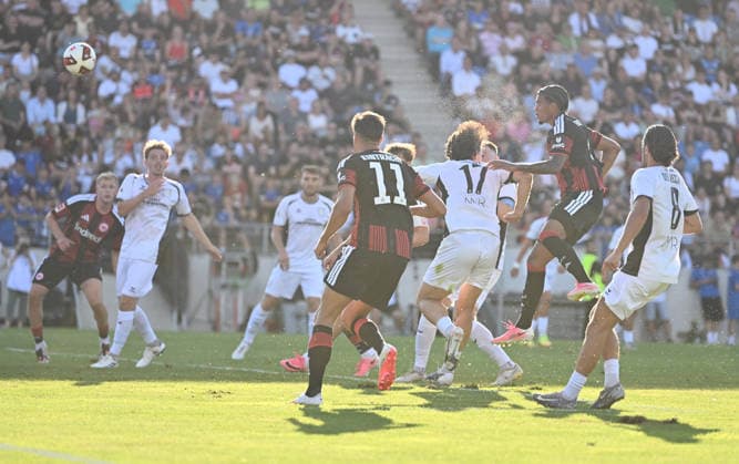 August 12, 2026, xfux, Soccer Friendly Match, FSV Frankfurt vs. Eintracht Frankfurt, from left: Goal Scorer Otavio, Eintracht Frankfurt Goal Scored, Goal to make it 0–1, header, header duel. DFL and DFB regulations prohibit any use of photographs as image sequences and or quasi-video. Frankfurt am Main