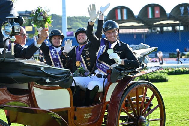 Aachen, Main Stadium, August 12, 2026, GER, FEI World Championships Aachen 2026, Lambertz Prize, Grand Prix Team Dressage: Photo of the winning Team Germany at the World Championships (from left): Team Manager Klaus ROESER (Germany), Isabell WERTH (Germany), Raphael NETZ (Germany), and Frederic WANDRES (Germany, North Rhine-Westphalia, Germany)