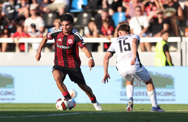 August 12, 2026, Soccer friendly match, FSV Frankfurt vs. Eintracht Frankfurt, from left: Mario Götze (Eintracht Frankfurt), Nick Doktorczyk (FSV Frankfurt). DFL and DFB regulations prohibit any use of photographs as image sequences and or quasi-video. xdcx Copyright: HMBxMedia Claus