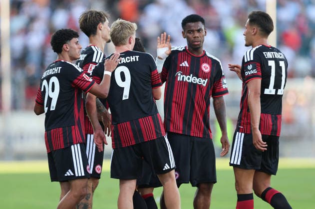 August 12, 2026, Soccer friendly match, FSV Frankfurt vs. Eintracht Frankfurt, from left, goal celebration for the 0–3 goal by Jonathan Burkardt of Eintracht Frankfurt, goal celebration, celebrating the goal. DFL and DFB regulations prohibit any use of photographs as image sequences and or quasi-video. xdcx Copyright: HMBxMedia Claus