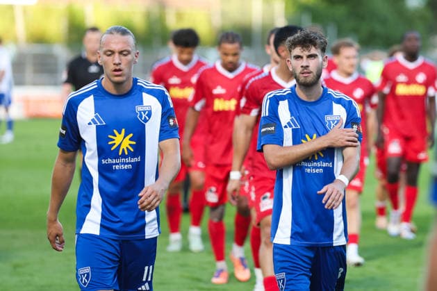 August 12, 2026, Soccer, Men’s, Regionalliga Nord, Matchday 16, FC Eintracht Norderstedt vs. BSV Kickers Emden: Matti Tjaden (left, blue, 11) of BSV Kickers Emden and Bogdan Shubin (blue, 8) of BSV Kickers Emden on their way to halftime