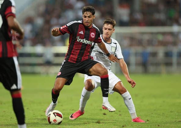 August 12, 2026, Soccer friendly match, FSV Frankfurt vs. Eintracht Frankfurt, from left: Fares Chaibi (Eintracht Frankfurt), Leandro Simunic (FSV Frankfurt). DFL and DFB regulations prohibit any use of photographs as image sequences and or quasi-video. xdcx Copyright: HMBxMedia Claus