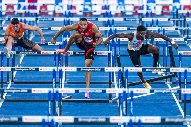 European Athletics Championships, Birmingham, August 12, 2026 BIRMINGHAM, UNITED KINGDOM AUGUST 12 Enrique Llopis (ESP, Spain), left, and Jason Joseph (Switzerland), center, compete in the semifinals of the men’s 110-meter hurdles while Elie Bacari (BEL, Belgium) falls on August 12, 2026, in Birmingham, United Kingdom Copyright: xBEAUTIFULxSPORTS UlfxSchillerx