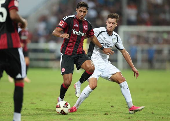 August 12, 2026, Soccer friendly match, FSV Frankfurt vs. Eintracht Frankfurt, from left: Fares Chaibi (Eintracht Frankfurt), Leandro Simunic (FSV Frankfurt). DFL and DFB regulations prohibit any use of photographs as image sequences and or quasi-video. xdcx Copyright: HMBxMedia Claus