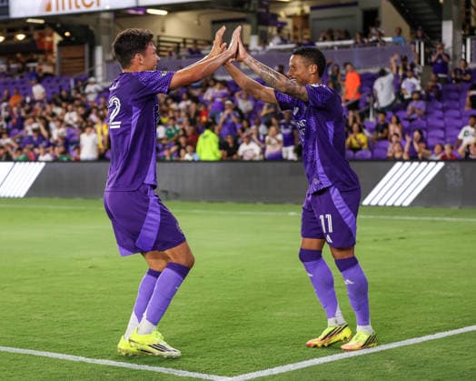 August 12, 2026, Orlando, Florida, USA: Orlando City SC forward JUSTIN ELLIS (22) and midfielder TIAGO SOUZA (11) celebrate a goal by ELLIS during a match against Atlo tico San Luis. Orlando City SC hosted Athletico San Luis in a Leagues Cup match at Inter.Co Stadium in Orlando, FL. Orlando USA - ZUMAm299 20260812_znp_m299_025 Copyright: xTaylorxMcFeex