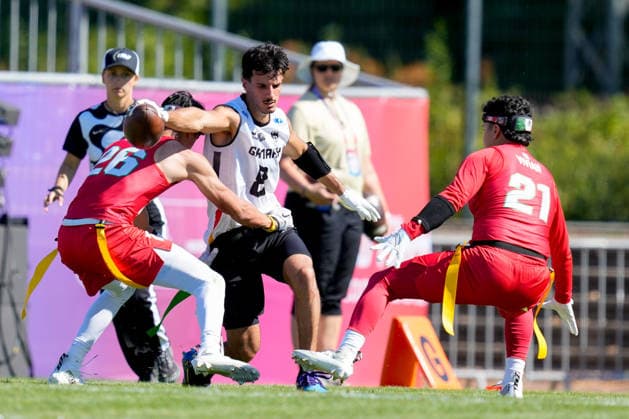 Santiago Vargas Rodriguez of Mexico, Malik Al Kahlout of Germany, and Javier Alberto Vivian Quintero of Mexico battle for the ball during the group stage match of the 2026 IFAF Men’s Flag Football World Championships between Mexico and Germany at the Flag Football Complex in Düsseldorf-Garath on August 13, 2026 in Düsseldorf, Germany. Photo by Alex Gottschalk, DeFodi Images