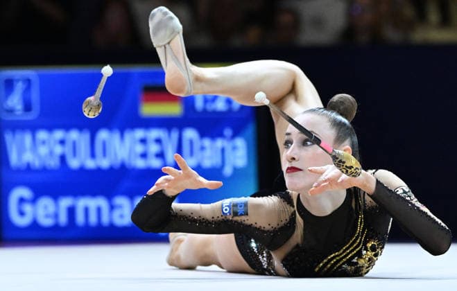August 13, 2026, xhbx, 2026 Rhythmic Gymnastics World Championships, from left: Darja Varfolomeev, Germany, Cologne, DFL, DFB. REGULATIONS PROHIBIT ANY USE OF PHOTOGRAPHS AS IMAGE SEQUENCES AND OR QUASI-VIDEO. Frankfurt am Main