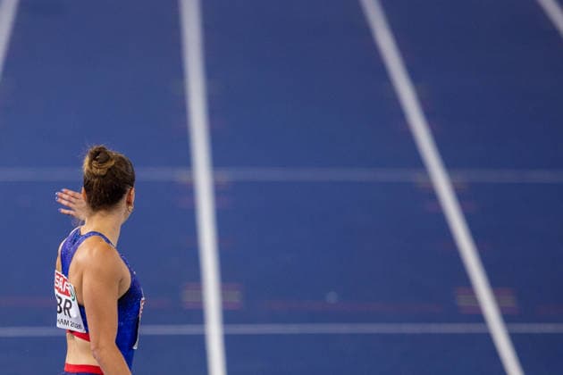 Charlotte Henrich of Great Britain and Northern Ireland waits for the change over of the baton in the Mixed 4x400m relay at the European Athletics Championships at Alexander Stadium in Birmingham, England Copyright: xSeanxWalshx Sportspressphoto_SPR205546